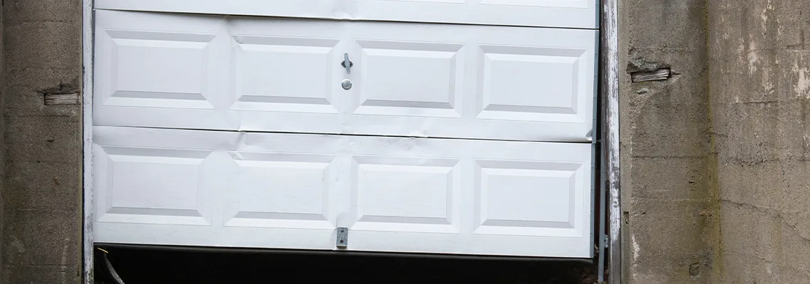 Garage Door Got Hit By A Car Dent Removal in Midland, ON