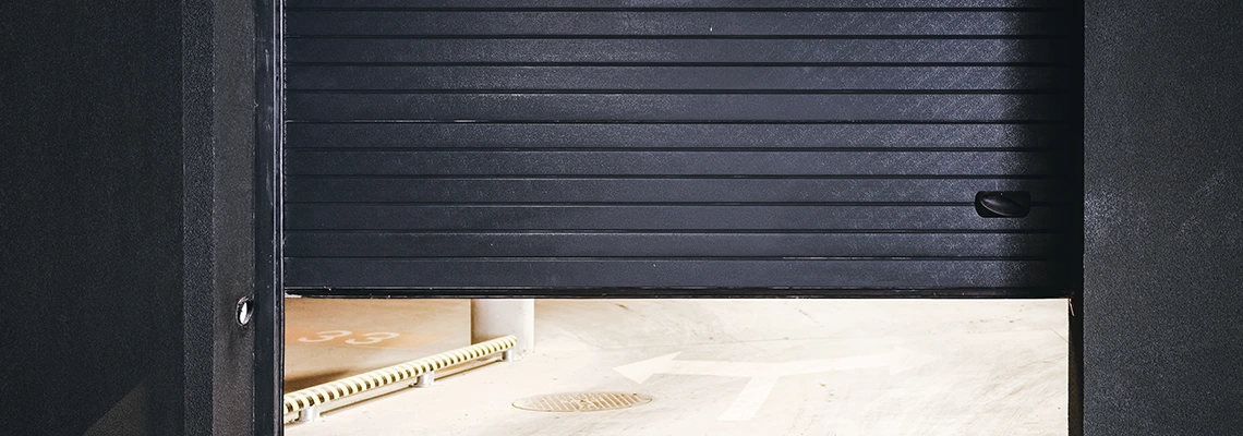 Residential Black Garage Door Installation in Port McNicoll, ON