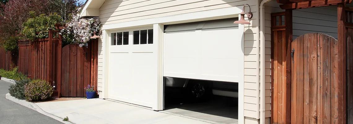 Fix Metal Garage Door Jerking in Midland, ON